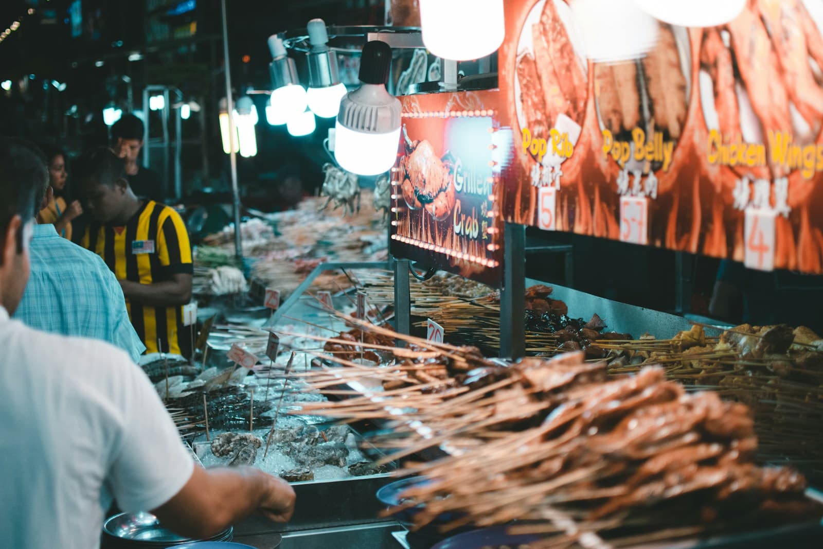 Busy night market stall in Jalan Alor, Kuala Lumpur